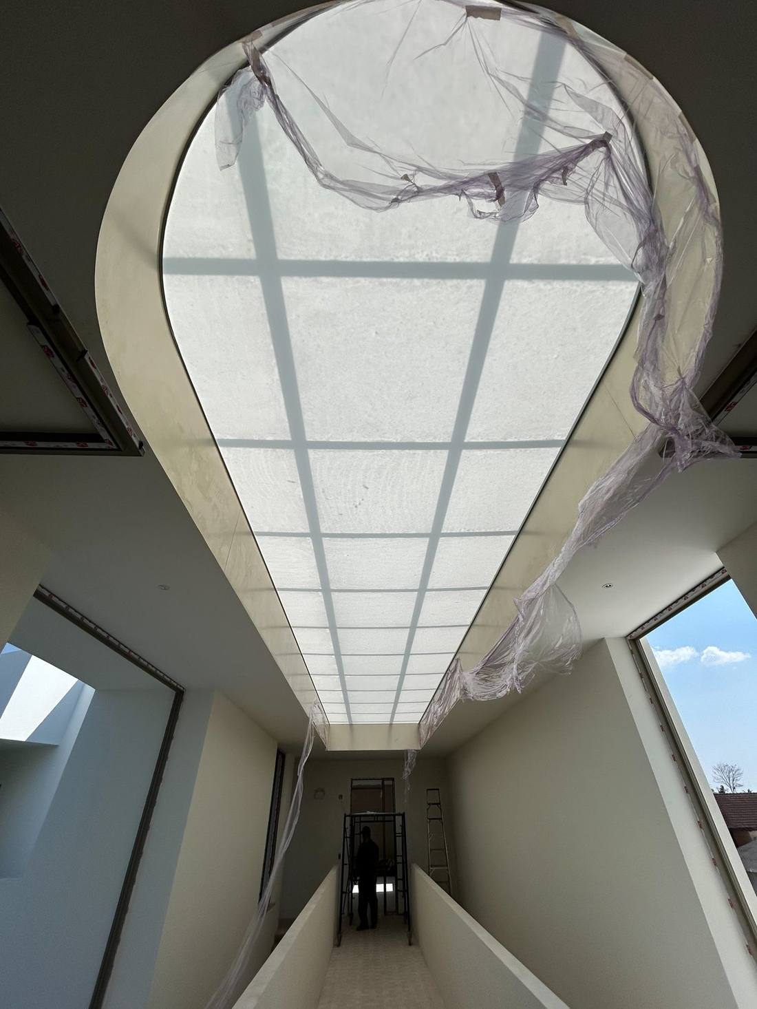 Teardrop-shaped stretch ceiling skylight