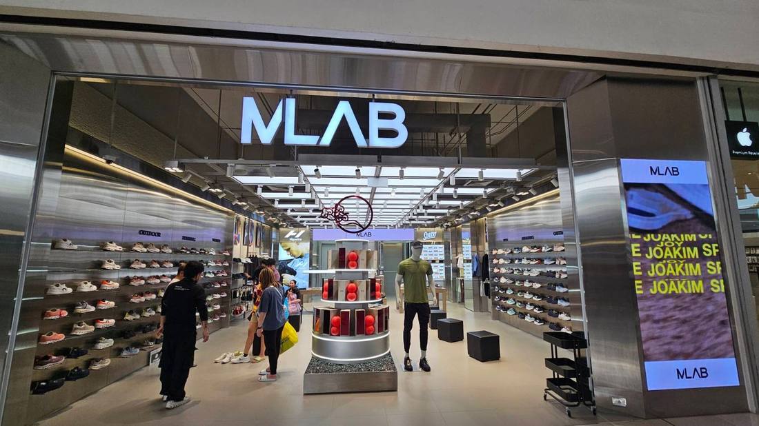 MLAB storefront facade with stretch ceiling